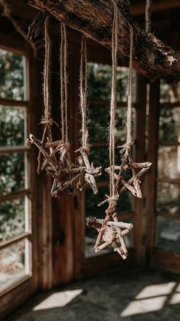 DIY rustic star ornaments made from sticks and twine hanging in a wooden cabin.