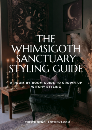 Whimsigoth sanctuary styling guide cover with moody witchy interior decor, velvet chair, candles, and moon wall art.
